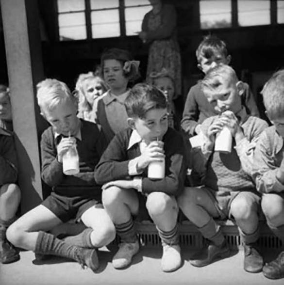 1960s-school-boys-in-shorts-drinking-milk-from-the-bottle.jpg